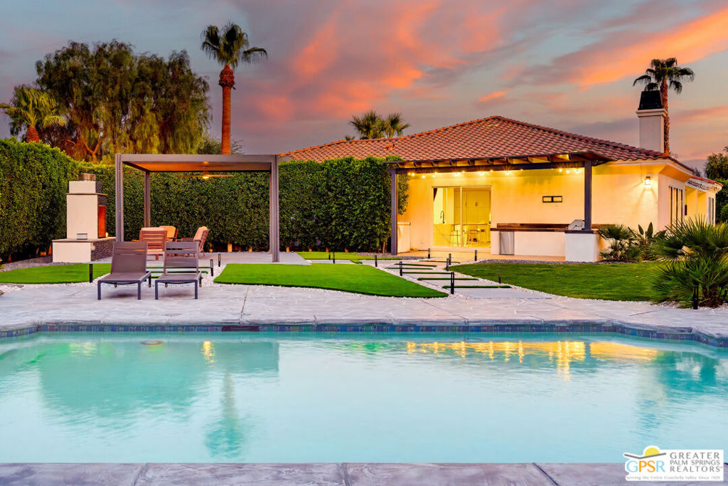 Welcome to Desert River Estates, a beautifully remodeled 4-bedroom + office, 4-bathroom home on over half an acre in Indio. Just minutes from the Polo Grounds home to Coachella and Stagecoach this property seamlessly blends modern design, high-end upgrades, and everyday comfort. Wide-plank flooring, custom carpentry, stained beams, and thoughtful architectural details create an inviting interior. The chef's kitchen boasts quartz countertops, and brand-new appliances, while the primary suite features a spa-style bath with a freestanding tub, frameless glass shower, and a customized walk-in closet. Upgrades and systems include gas-powered kitchen, water heater, and dryer, a fully owned year-old solar system, a Flo Logic water meter to prevent flooding, and a Halo water treatment system for clean, high-quality water. A brand-new mini split in the garage adds comfort, and all HVAC systems are new. Plumbing has been updated, and pool equipment is fully replaced for reliable performance. Outdoors, the home is designed for both entertaining and family enjoyment. The re-tiled pool is accompanied by an oversized BBQ island, outdoor fireplace, sport court, tot lot, and dramatic lighting that enhances the landscaped grounds. The property offers ample space for recreation, relaxation, and social gatherings in a serene desert setting. This stylish, move-in-ready retreat combines luxury, practicality, and comfort in one of Indio's premier gated communities. Its prime location near festivals, golf, shopping, and the best of the Coachella Valley makes Desert River Estates an unmatched opportunity to enjoy the desert lifestyle at its finest.