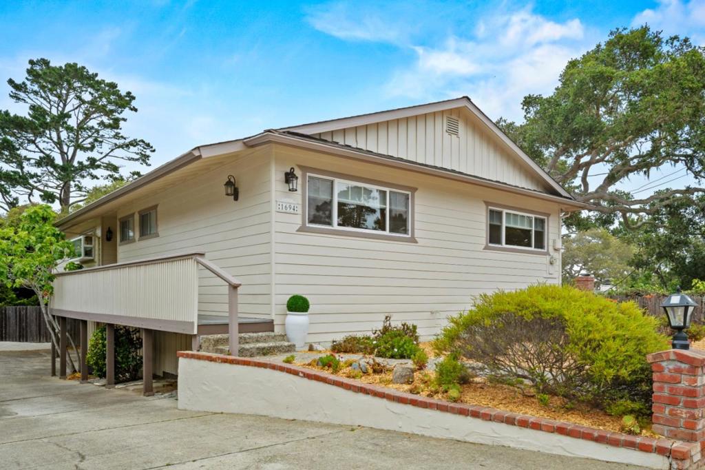 Located in the beautiful New Monterey area, this charming 3-bedroom, 2-bath single-level home offers the perfect blend of comfort and convenience. Ideally situated just minutes from local amenities, shopping, restaurants, and the area's stunning beaches and scenic coastline, this home invites you to experience the best of the Monterey Peninsula lifestyle. Inside, you'll find a tile kitchen with generous cabinet storage, a separate dining area with a slider that opens to an outdoor deck perfect for entertaining, and a living room framed by windows that fill the space with natural light. An inviting brick fireplace and warm-colored floors throughout the main areas and bedrooms create a cozy and welcoming atmosphere. Whether strolling historic Cannery Row, enjoying the ocean breeze, or relaxing in your own backyard, this home offers the ideal combination of location and livability.