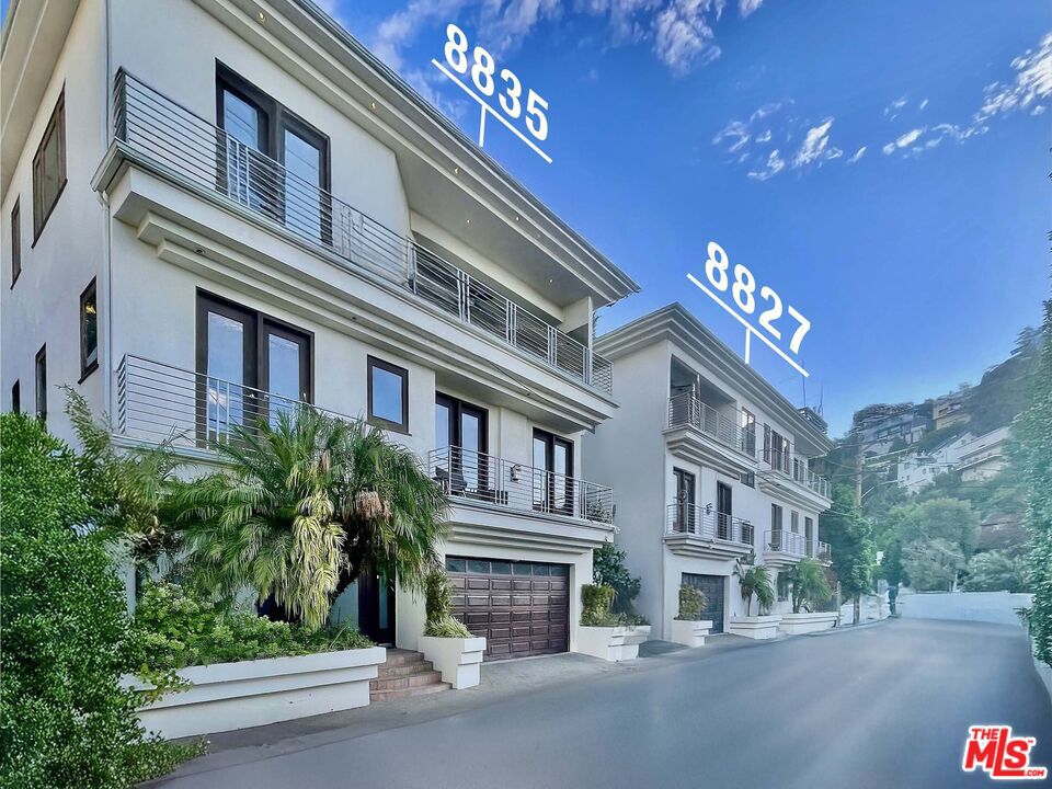 One-of-a-kind private celebrity compound with unobstructed views from downtown to the ocean and across the entire LA basin. Situated on a quiet and desirable cul-de-sac just off Lower Sunset Plaza Drive, in the world-renowned Sunset Strip above Sunset Boulevard. This 6,366 sq. ft. estate offers 8 bedrooms and 6 bathrooms, with an open gourmet chef's kitchen and multiple living areas. A 2,000 sq. ft. rooftop cabana with a full kitchen crowns the home, capturing panoramic views of LA's landmarks and the ocean. Additional amenities include a plush movie theater, game room, executive office, private pool, hot tub, steam sauna, yard, and multiple balconies, creating the ultimate entertaining property. The luxurious primary suite offers its own private view deck, dual walk-in closets, and dual bathrooms with steam showers. A grand staircase and wood-paneled elevator connect all levels to the rooftop. Offered individually at $4,650,000, or together with neighboring 8827 Evanview for $9,300,000, a coveted opportunity to assemble two adjacent turnkey estates above the Sunset Strip. An unparalleled acquisition, whether curated as a private compound or structured as a strategic investment with income potential, including 1031 exchanges. A singular financial and lifestyle holding in the Hollywood Hills.