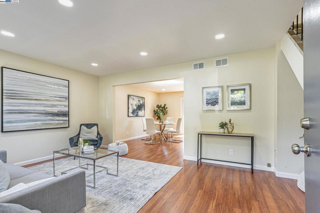 Landlord No Mo'! Step into this tastefully updated NorthEast-facing townhome in Fremont’s highly desirable Parkmont Village. Drenched in natural light this 3-bed, 1.5-bath gem features fresh interior paint, recessed lighting and laminate flooring on the main level. The modern kitchen is a true highlight; boasting sleek countertops and updated cabinets; perfect for home chefs and entertainers alike. The spacious dining area flows seamlessly to a private patio ideal for BBQs, morning coffee or play area for children. Upstairs, you’ll find three generously sized bedrooms and a renovated full bath. Enjoy the convenience of inside laundry, dual-pane windows, central heating, two assigned parking spaces and plenty parking for your guests. Property faces open green space offering privacy and a low-maintenance lifestyle. With only a $327/month HOA that includes water and exterior maintenance, this move-in ready townhome offers the perfect blend of comfort and flexibility. All this within walking distance from top-rated Parkmont Elem, Centerville Middle, and Washington High (9/10 rating) - making it a favorite among Silicon Valley professionals who deeply value academic success. This one checks all the boxes—don’t miss your chance to call it home! Open House Sat (9/13) & Sun (9/14) 1-5PM