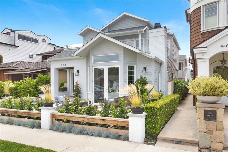 Completely redesigned and reconstructed 3-bedroom front home. Infused with natural light and the finest fixtures and finishes throughout, the home is brimming with walls of windows, wide-plank wood flooring and soaring ceilings. Instrumental to the Village lifestyle, the large front courtyard is off French doors from an expansive living room replete with fireplace. A main floor ensuite bedroom and formal dining room lie adjacently to the performance kitchen providing abundant cabinetry, sprawling quartz counters, a walk-in pantry, center island, breakfast nook and bay window overlooking the rear entertaining patio that separates the main house from the back house. The expertly designed master bedroom supplies a retreat with fireplace, walk-in closet, sundeck and spa-like master bath with marble vanity, separate spa and glass-framed shower. Private laundry.  Live the Corona del Mar Lifestyle in the highly sought-after section of the Village; near Begonia Park and centrally located to beaches, shops and restaurants.