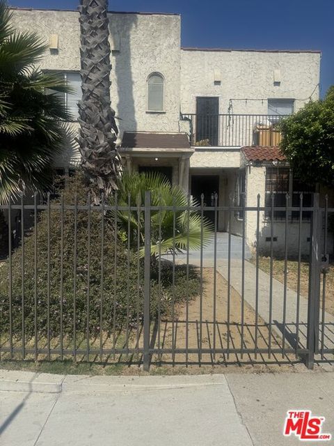 Photo of 6125 West Boulevard, Los Angeles, CA 90043 (MLS # 25554081)