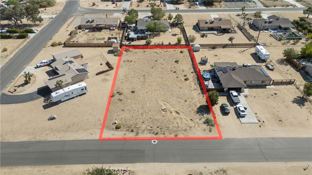 Welcome to 58167 Spring Rd., a spacious vacant flat leveled lot located in the heart of Yucca Valley. This parcel offers the perfect opportunity to build your desert retreat, investment property, or forever home. Nestled in a peaceful neighborhood with beautiful desert and mountain views, the property provides both privacy and convenience, just minutes from local shops, dining, schools, and outdoor recreation.
With its close proximity to Joshua Tree National Park, this lot is ideal for those seeking the tranquility of desert living while still enjoying modern amenities nearby. Utilities are accessible on the stret, making your vision easier to bring to life.
Whether you’re an investor, builder, or dreamer, 58167 Spring Rd. offers endless potential in one of the High Desert’s most desirable communities.