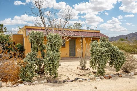 Photo of 6155 Cahuilla Avenue, 29 Palms, CA 92277 (MLS # JT26088142)