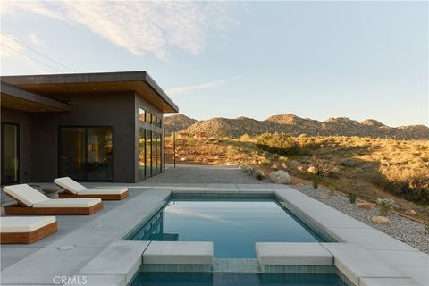 Photo of 5137 Pioneertown Road, Pioneertown, CA 92268 (MLS # JT26065349)