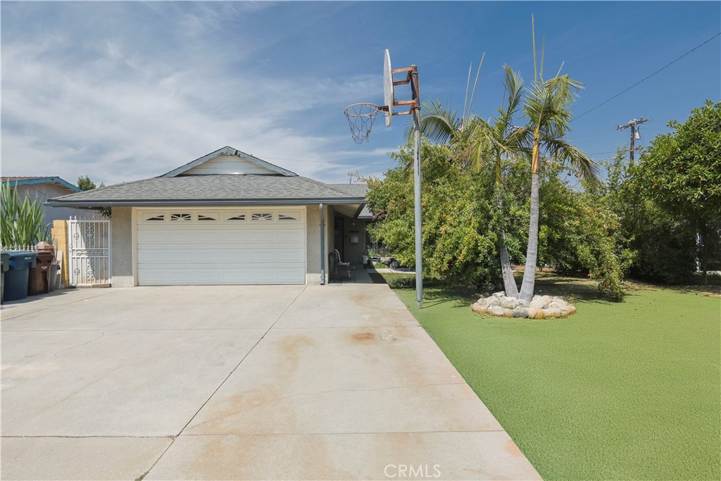 Experience the value of legacy and location. This single-level home, lovingly held by one family for over three decades, offers nearly 1,320 square feet of living space, tucked on a generous 6,000 sqft lot. With 3 bedrooms, 2 baths, a fireplace, and laundry, it's perfect for restoration to modern standards or creative expansion. Featuring a 2-car garage, private yard space, and subtle city light views, the property invites new owners to build equity and bring their vision to life. This home represents a smart investment in El Monte’s desirable Mountain View neighborhood, with no HOA fees, quality schools, and room to grow.