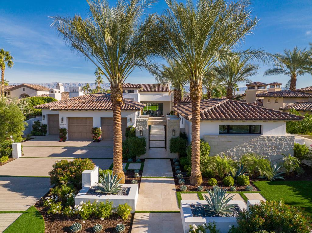Stunning modern estate at the Hideaway! Four bedrooms including a separate casita plus media room, four and a half baths. This is a newer home just completed in 2020 and is approx. 5,187 sq. ft. on .40-acre lot. Features a beautiful courtyard entry with flanking custom fountains to front loggia with media and pocket doors. Great room with fireplace and media. Gourmet kitchen with large quartz island and counter bar, top of the line appliances and dining room with custom wet bar and two wine coolers. Gorgeous media room/office and luxurious guest accommodations including a separate casita with wet bar. The master suite features a custom fireplace, sitting areas and a spa inspired bath with Japanese soaking tub, marble /glass shower and the ultimate walk- in closet. The finishes on this home are exquisite with wood beamed ceilings, oak flooring, Lutron lighting and elegant detailing throughout. The open floor plan with motorized pocket doors on both front and back offers the best in indoor and outdoor entertaining. Custom infinity pool and inlaid spa, custom fire pit and awesome lake and golf course views above the 18th hole on the Pete Dye course. Property is offered turnkey furnished including artwork. Hideaway golf membership is mandatory and separate.