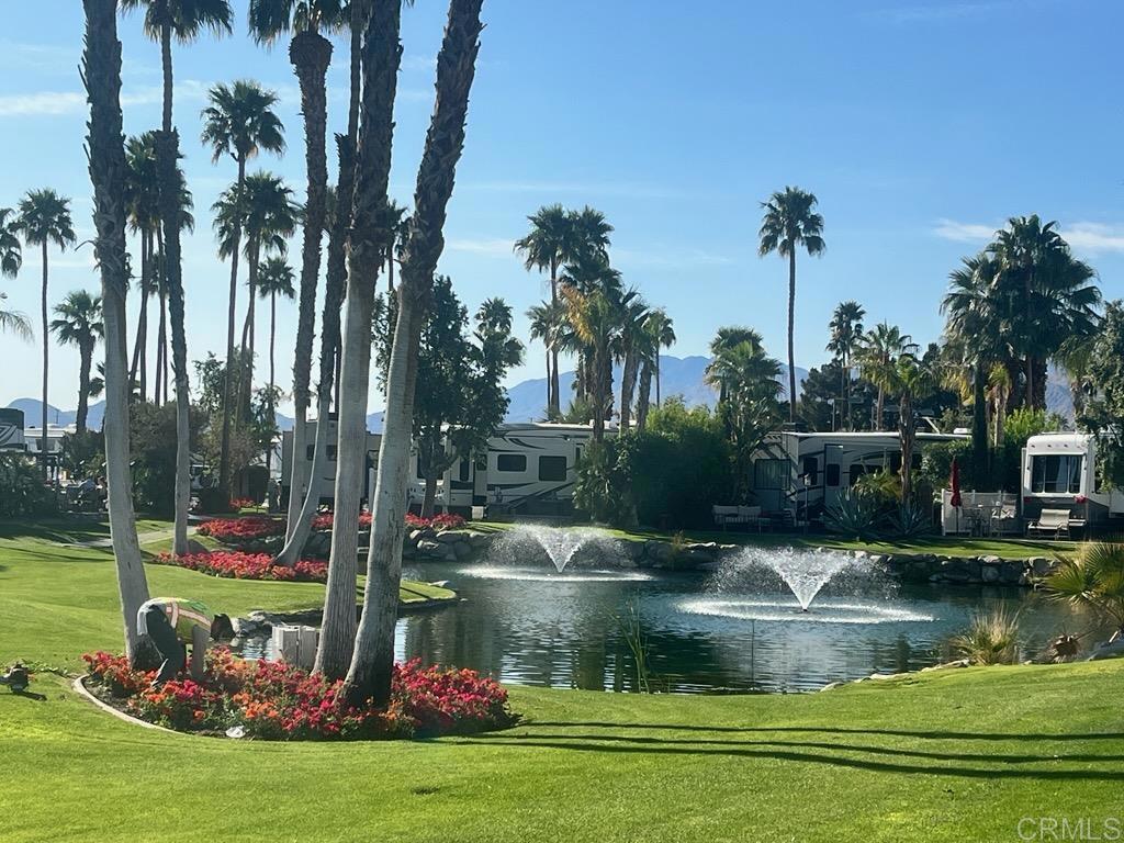 Lot 1209, ULTIMATE PACKAGE SALE, including an expansive 2017 Cameo, 41’ fifth wheel, golf cart and 2007 Ford Edge! Bring your swimsuit and move it sits near the ponds on the east side on ORPS on its beautiful back nine golf course. An original lot waiting to be turned into a designers dream, with views of water, golf and mountains! Outdoor Resort Palm Springs (ORPS) is a Guard Gated 5-Star RV Resort Community offering an active and luxurious lifestyle featuring golf (27 holes), tennis, pickleball, swimming and more! Two clubhouses, fitness center, beauty solan, La Roma Restaurant on campus, dog park and more!