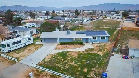 Photo of 13341 Rancherias Rd, Apple Valley, CA 92308 (MLS # HD26037299)