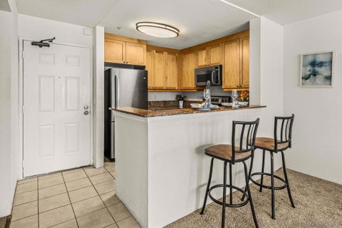 Photo of 8889 Caminito Plaza Centro #7225, San Diego, CA 92122 (MLS # 260020388SD)