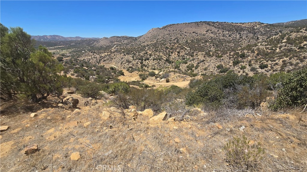 Breathtaking Panoramic Views – Your Private Escape Awaits in Anza!
Tucked away off the beaten path, this nearly 20-acre parcel offers an extraordinary opportunity to own a piece of secluded paradise. Surrounded by the natural splendor of the San Jacinto Mountains, you'll enjoy 360-degree panoramic views that will take your breath away.
This unique property features gently sloped terrain with accessible flat areas—ideal for building your dream home, setting up gardens, or creating your very own ranch retreat. Whether you're into hiking, horseback riding, or simply soaking in the serene landscape, this is a haven for nature lovers and outdoor enthusiasts.
Property Highlights:
Just under 20 acres of usable land
Private well and electricity already on site
Surveyed and ready for development
Multiple metal-framed hoop houses included
40 ft insulated cargo container
Optional non-working motorhome for additional storage
Abundant space for gardens, animals, and off-grid living
Located in the quiet and welcoming community of Anza, this property offers a rare combination of privacy, space, and value. Enjoy the charm of all four seasons—from cozy snowfall in the winter to mild, comfortable summers. Anza boasts a lower cost of living and a tight-knit rural community, all within an easy drive to Temecula, Palm Springs, and other nearby hubs for shopping, dining, and entertainment.
Whether you're looking to build a peaceful homestead, develop a ranch, or invest in land with unlimited potential, this property delivers.
Experience the beauty, space, and tranquility of Anza—your dream lifestyle starts here.