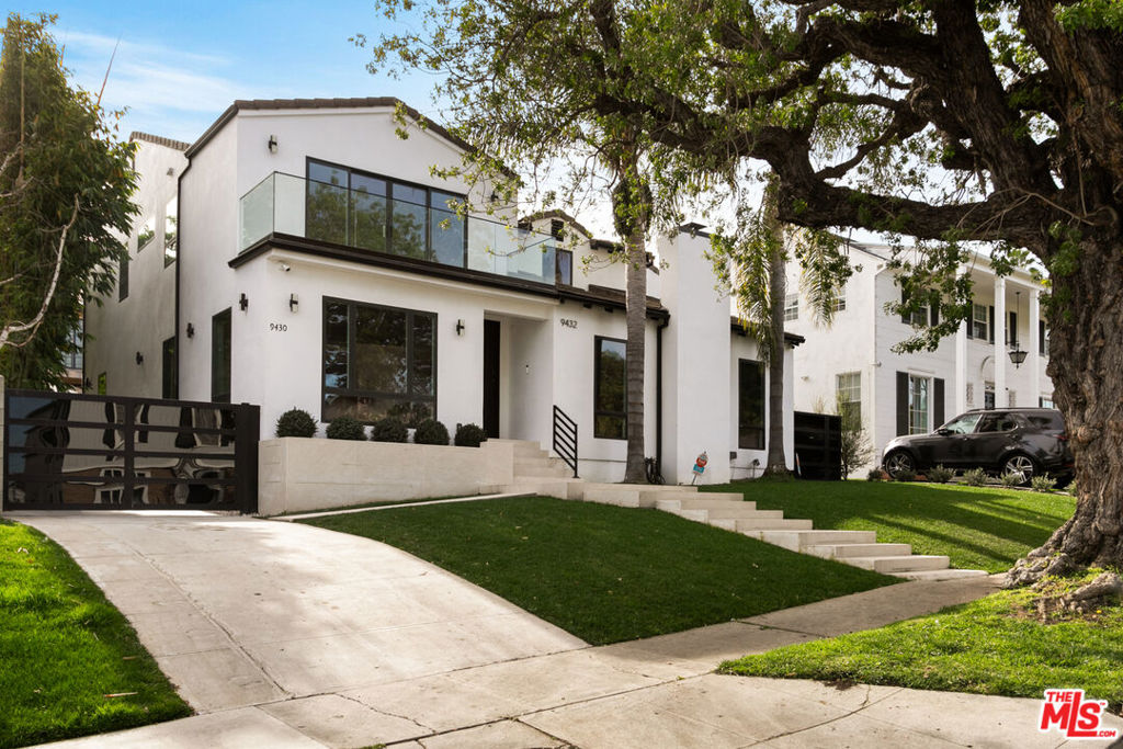 Welcome to 9432 & 9430 Oakmore Rd, a fully remodeled and expanded luxury estate in the heart of Beverlywood, offering the ultimate blend of privacy, design, and flexibility. This rare compound includes a permitted detached ADU (~400 sq. ft.) with separate entrance, full kitchen, bathroom, and its own electrical meter ideal for guests, rental income, private office, or multigenerational living.The main residence features 5 spacious bedrooms and 5 luxurious bathrooms, with an additional half-bath option depending on configuration. The interiors are crafted with premium hardwood flooring, custom millwork and closets, Italian tile accents, and high-end fixtures throughout.At the center of the home is a state-of-the-art kosher chef's kitchen outfitted with:Dual sinks & dual ovensCommercial-grade appliancesSleek cabinetry & quartz countertopsLayout optimized for entertaining and gourmet cookingThis is a fully integrated smart home, equipped with:Lutron RadioRA 3 lighting controlWhole-home built-in sound systemMilgard dual-pane energy-efficient windowsCentral heating/air + modern insulation upgradesOffered fully furnished, this designer-curated home includes:Plush king and queen bedsItalian leather queen-size sofa bedsPremium new mattressesHand-selected furnishings for both aesthetics and comfortStep outside into a true private oasis, featuring:Heated pool and spaImported Italian tile patio & hardscapeLush landscaping & hedges for full privacyGas BBQ hookup, outdoor dining, and lounging zonesLocation highlights:Steps from Circle ParkUnder 10 minutes to Beverly Hills, Century City, Fox Studios, and downtown Culver CityQuick access to Pico-Robertson shops, kosher markets, schools, and diningWhether you're seeking a primary residence, investment, or short-term rental opportunity, this property is turnkey and move-in ready.Disclosure:All information deemed reliable but not guaranteed. Buyer to verify all details including but not limited to square footage, room count, permits, and school boundaries. Furniture, appliances, and finishes shown or described may vary from listing images. Property is offered as-is. Neither seller nor broker guarantees accuracy. Renderings and floor plans are for illustrative purposes only.