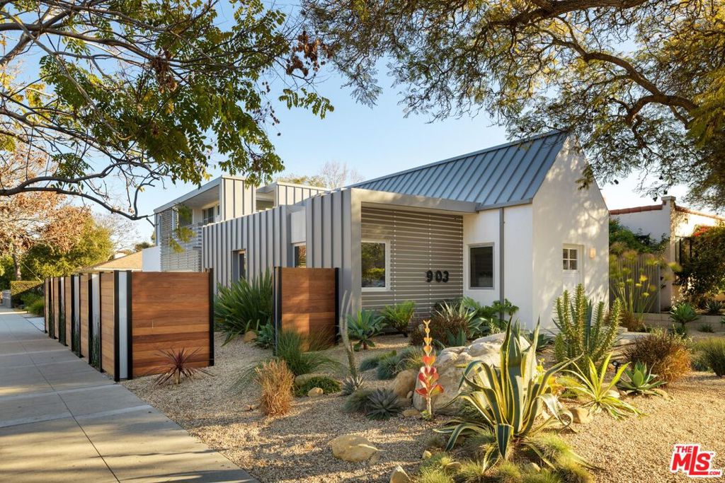 Abundant light, soaring ceilings and award winning design in this contemporary property with legal ADU. This home is intentionally designed to maximize space and functionality while incorporating natural light with green architectural techniquesensuring a stylish and serene home environment. Created by AB Design Studio in 2013, this perfect mix of exceptional quality and timeless, sustainable steel, wood, glass, polished concrete floors, metal roof and siding earned this property a 2016 AIA design award.Meticulously maintained and updated, the 1414 SF modern dwelling features 3 bedrooms and 2 full bathrooms in two separate living spacesstrategically situated on a nearly 5000 SF corner lot. Every detail and square foot is maximized in the main home's open concept planincluding a spacious great room with the high vaulted ceilings leading up to the cozy meditation/library loft (not included in the total SF).The euro-style galley kitchen is equipped with sleek cabinetry and professional quality appliances including a gas range, dishwasher, oversized refrigerator and ample counter space to host family and friends.Expansive side patio enclosed by the ultra-custom ipe wood, frosted glass and aluminum fence. The ideal space to enjoy the Santa Barbara al fresco lifestyle all year long.The upper legal ADU's open floor plan offers a streamlined detached living space with great room, chef's kitchen, bedroom, full bath and private balcony to take in the captivating mountain views.