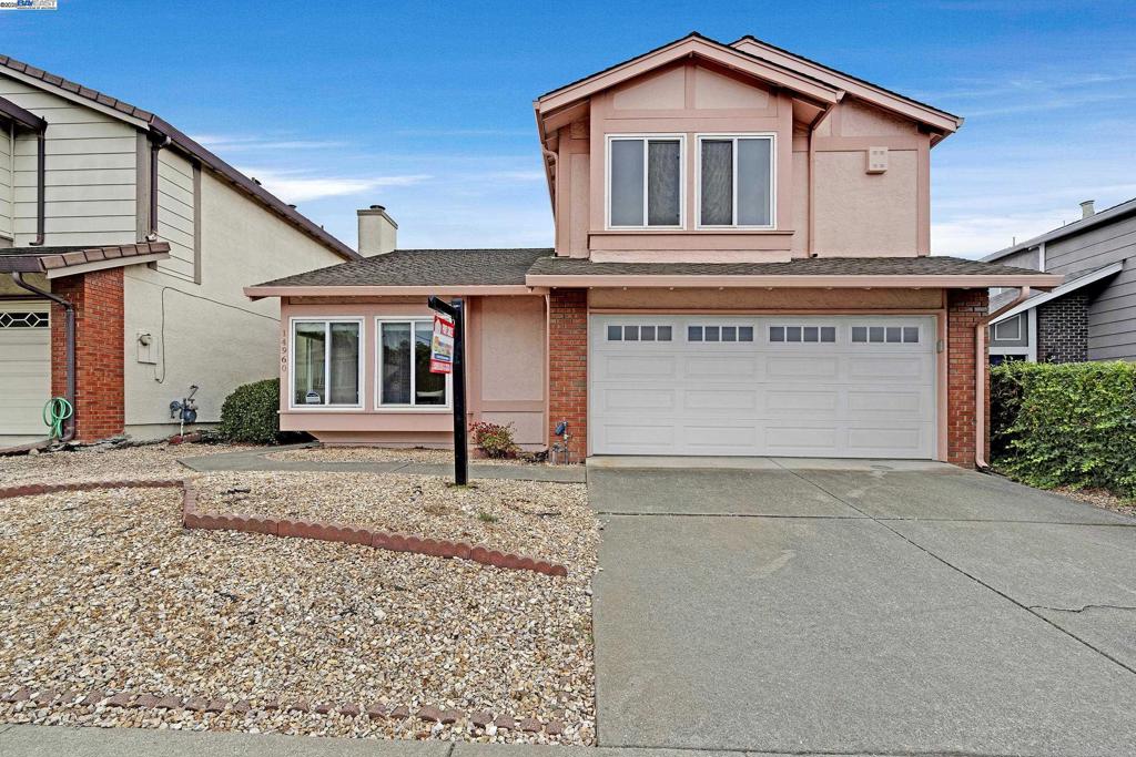 Beautiful 3-Bedroom, 2.5-Bath Home in a Quiet Neighborhood. Step into a welcoming living room with soaring vaulted ceilings that create a bright and open atmosphere. The cozy family room features a charming brick wood-burning fireplace with a convenient gas starter, plus a sliding glass door leading out to the back yard—perfect for relaxing or entertaining. The large, updated kitchen offers an abundance of cabinetry, granite countertops, a smooth-top stove with vent hood, dishwasher, and refrigerator, making it ideal for everyday living and cooking with ease. Upstairs, both bathrooms are enhanced with recessed lighting. Conveniently located near freeways, top schools, shopping, parks, and restaurants, this home combines comfort, style, and accessibility in one perfect package. 3D dollhouse: https://my.matterport.com/show/?m=iZBFbLqE7Rw