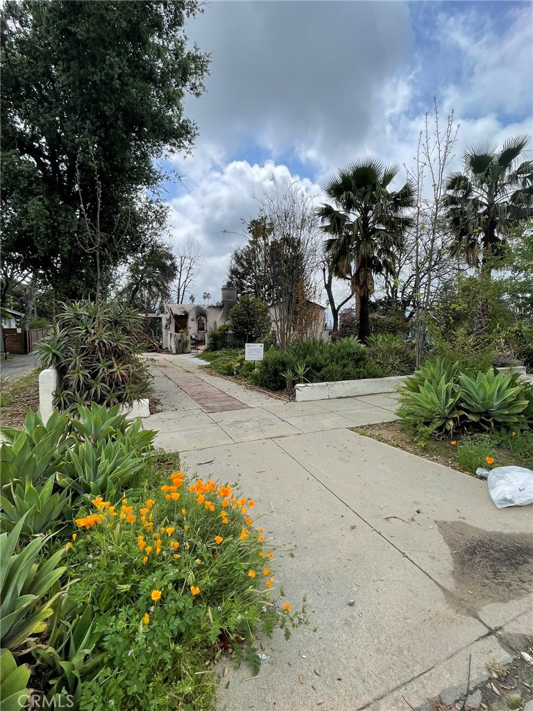This vacant lot offers a rare chance to build new in a highly sought-after Altadena neighborhood. The previous home was lost in the Eaton Fire, and the site has since undergone inspection. Utilities were previously connected and are available at the street (buyer to verify restoration requirements). The property is being sold as-is, and buyers are strongly encouraged to conduct their own due diligence with Los Angeles County and other relevant agencies regarding future development, permitting, and any remaining site considerations. This is a unique opportunity to create a custom home in an established residential setting surrounded by natural beauty. Drive-by only. Do not enter the lot due to safety protocols.