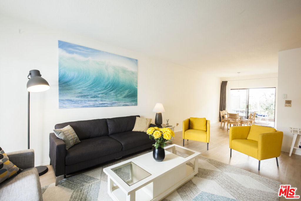 Light & Bright Santa Monica Townhome 2 Bedrooms, 2.5 Bathrooms!With over 1,500 sq ft of living space, this beautifully maintained home offers vaulted ceilings, an expansive living room with fireplace, and an open floor plan that flows seamlessly into the dining area and spacious kitchen. The kitchen features tile countertops, double sinks, a four-burner stove, dishwasher, and single-door refrigerator.Enjoy sunny afternoons in your private garden patioperfect for entertaining or quiet relaxation. Both bedrooms are en-suite masters located upstairs. The primary suite boasts a cozy fireplace, walk-in closet, high ceilings, a large master bath, and a sunlit balcony retreat.Additional highlights include a full-size front-loading washer & dryer conveniently located upstairs and direct access to a private 2-car garage.Ideally situated just moments from the Santa Monica Pier, Main Street, 3rd Street Promenade, the Metro, and world-class dining, shopping, and the beachthis is the perfect blend of comfort and coastal lifestyle. Don't miss this spacious and serene place to call home!