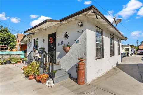 Photo of 2111 E 118th Street, Los Angeles, CA 90059 (MLS # DW26192040)