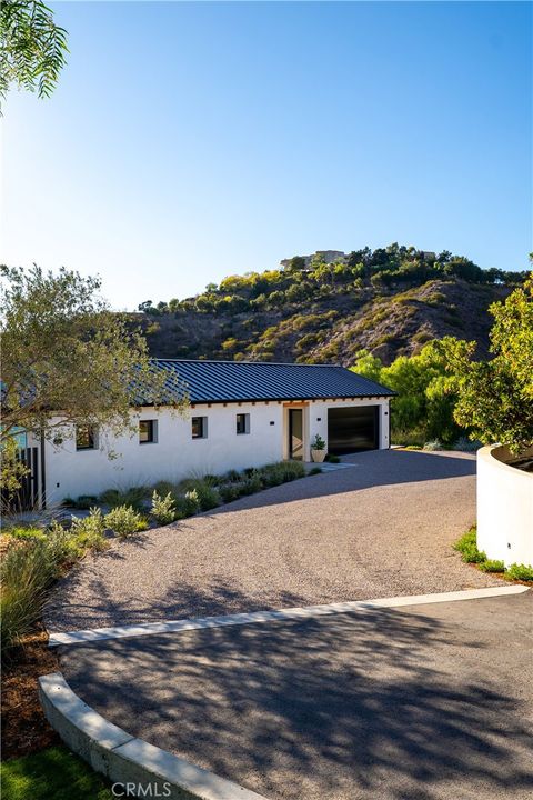 Photo of 5941 Trancas Canyon Road, Malibu, CA 90265 (MLS # SR25106630)