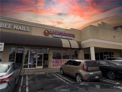 Photo of 716 E Arrow Highway, Pomona, CA 91768 (MLS # IV26031934)