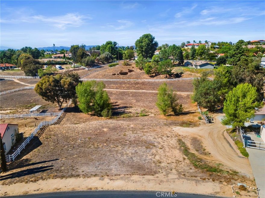 Rare opportunity to own nearly a full acre in the highly sought-after Meadowview community of Temecula! This 0.93-acre parcel is the perfect canvas to design and build your dream home. Meadowview residents enjoy exceptional amenities including miles of equestrian trails, open greenbelts, a community clubhouse, swimming pools, tennis & pickleball courts, basketball, and playgrounds. Added benefits include low property taxes and a low-cost HOA. Conveniently located near top-rated Temecula schools, shopping, dining, wine country, and freeway access, this lot offers the charm of country living with city convenience.

Buyer and buyer’s agent to verify zoning, permitted uses, and all building requirements/restrictions. Possible easement on propety.  Buyer to verfiy all.  

Water on property.