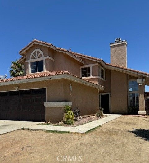 Photo of 1187 White Tip Lane, Perris, CA 92571 (MLS # CV26097396)