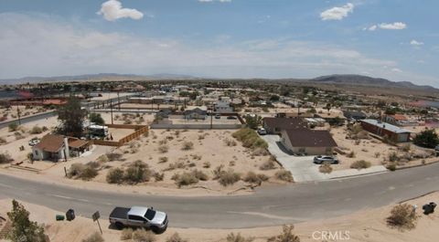 Photo of 6551 Bullion Avenue, 29 Palms, CA 92277 (MLS # JT26063042)