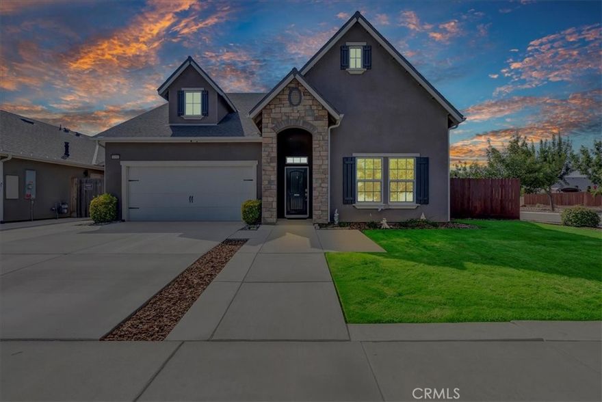 Gorgeous two-story home with modern upgrades and an assumable VA loan at just 2.5%! This property features owned solar and sits on a desirable corner lot in a premier Northwest Hanford neighborhood.



Step outside to a thoughtfully designed backyard with a gated garden area, built-in planter boxes, chicken coop, lush landscaping, covered patio, grass area, and a designated dog run.



Inside, natural light and tall ceilings create an inviting atmosphere. The home boasts a spacious front living room, an oversized family room, and a chef’s dream kitchen with a massive center island.



Upstairs, the luxurious primary suite offers dual vanities, a soaking tub, a standing shower, and a large walk-in closet. You’ll also find a versatile loft and three additional spacious bedrooms, each styled with designer finishes and premium carpet and tile.



Conveniently located near shopping, premier schools, great restaurants, and just a quick drive to NAS Lemoore.



This home truly has it all—style, function, location, and unbeatable financing options. Bath count is different than tax records. Buyer to verify.