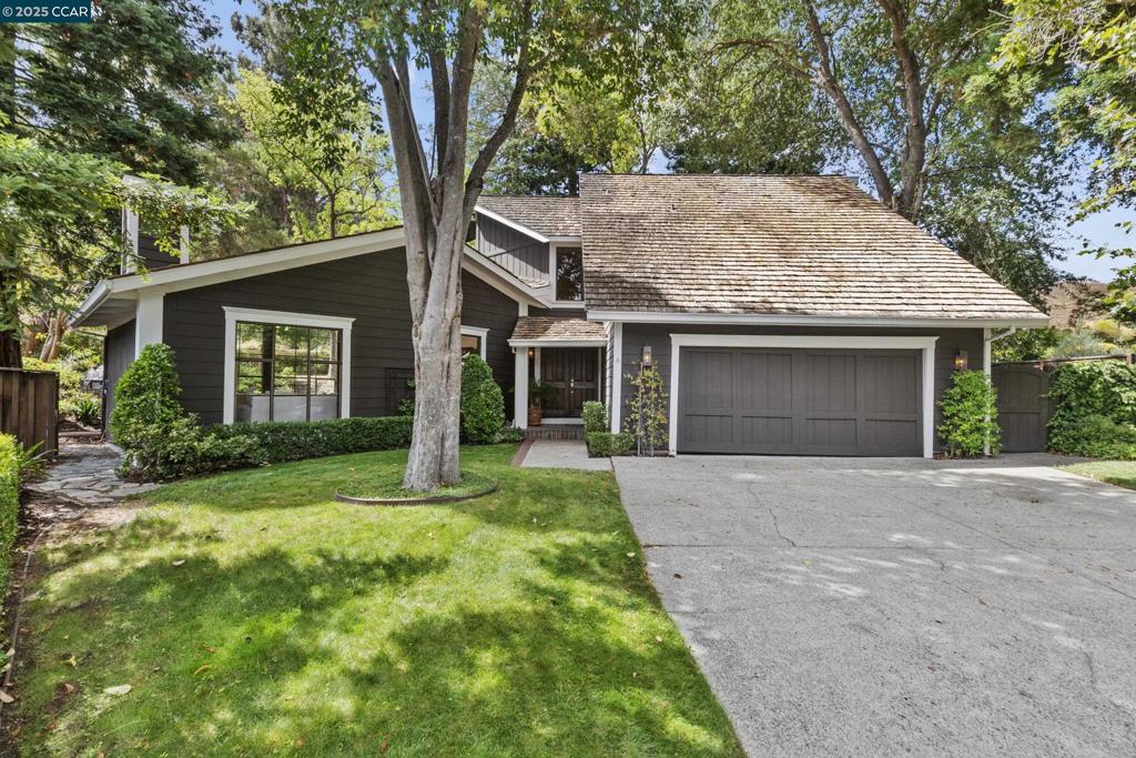 Danville’s Sycamore neighborhood is among the most coveted because of its abundant Open Space and proximity to great schools and downtown. This 4-bedroom, 3-bath home is owned and loved by the original Owners, and it offers 2,832 sq ft of beautifully designed living. The ground floor includes a bedroom and full bath, an office, a laundry room, and the family room. Soaring ceilings with walls of glass invite the outdoors in to the large Living and Dining areas. These spacious rooms flow into the kitchen, which has French doors opening to the lush backyard with an outdoor fireplace and patio perfect for year-round entertaining. The oversized yard offers a plethora of options for fun additions such as an ADU, a pool and cabana, a putting green etc. Located at the end of a cul-de-sac, with access to the popular Sycamore HOA with pools, tennis & pickleball courts, greenbelt with trails and a community clubhouse. Low HOA Dues of only $145 monthly