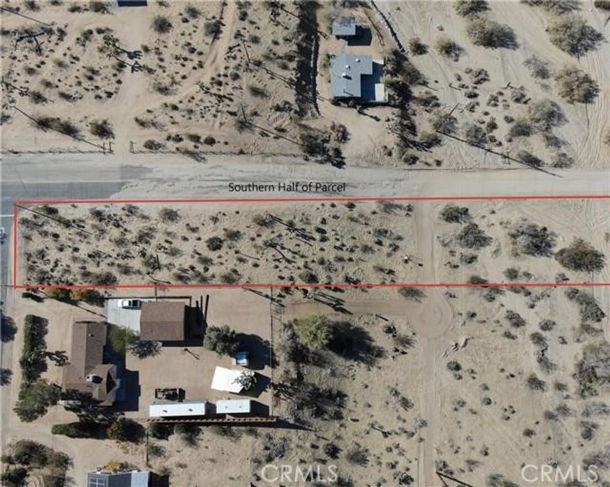 Discover the perfect canvas for your desert masterpiece. This 1.29-acre corner lot sits just one mile from Joshua Tree Village, offering the ideal balance of privacy, accessibility, and breathtaking natural beauty. With its prime corner location, this parcel provides a greater sense of space, easy access, and an elevated presence within the neighborhood — the ideal setting for a striking architectural home or luxurious desert retreat.



Enjoy panoramic vistas that stretch from the iconic rock formations of Joshua Tree National Park to the snow-capped peaks of Big Bear Mountain shimmering on the horizon. The lot features paved road access and utilities available nearby, ensuring a smooth path to development without sacrificing the serene, unspoiled atmosphere that makes the High Desert so special.



Whether envisioned as a private sanctuary, modern vacation home, or creative escape, this property embodies the essence of refined desert living — a rare opportunity to build your dream in one of California’s most sought-after destinations.