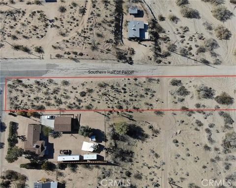Photo of 1 Hilltop Drive, Joshua Tree, CA 92252 (MLS # JT25248666)