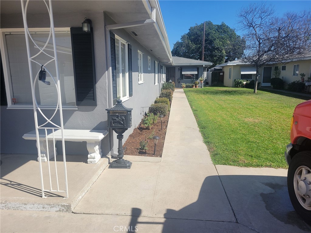 This is a newly purchased completely remodeled ground level unit complete with a close by one car separate garage. Owner has completely remodeled this delightful single story unit with wood flooring, new paint and fixtures. He has also included a new stove/oven, dishwasher and stacked washer & dryer.
The unit boasts of a large rear facing living room which oversees the private rear yard and has a new sliding glass door for easy access. The kitchen is off the entry hall and has a large area for a table and four chairs, with room to spare. The bedroom is to the rear for privacy and the full bath is directly across the hall. The bath features a new shower/tub area, sink and counter space as well as a near new toilet. There is a window in the bath, allowing for more air flow and ventilation.
The rear yard does have a cover over it, to give more shade and privacy and there is no one directly behind you, so it is peaceful and private. This unit is at the end of La Plaza and there is little traffic driving past the building and NONE driving past the particular unit as it faces the large front yard.
This is a real nice unit, so you better hurry. CALL Steve for details.