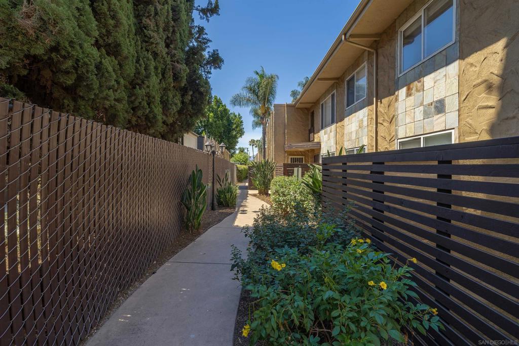 Just renovated with new hardwood laminate flooring throughout the living room and bedrooms, new paint, new dishwasher and stove. Ready for move-in today! Quiet upstairs corner unit with 2 assigned parking spaces in a gated community. Looks great and priced to sell! Vacant. Go show today!