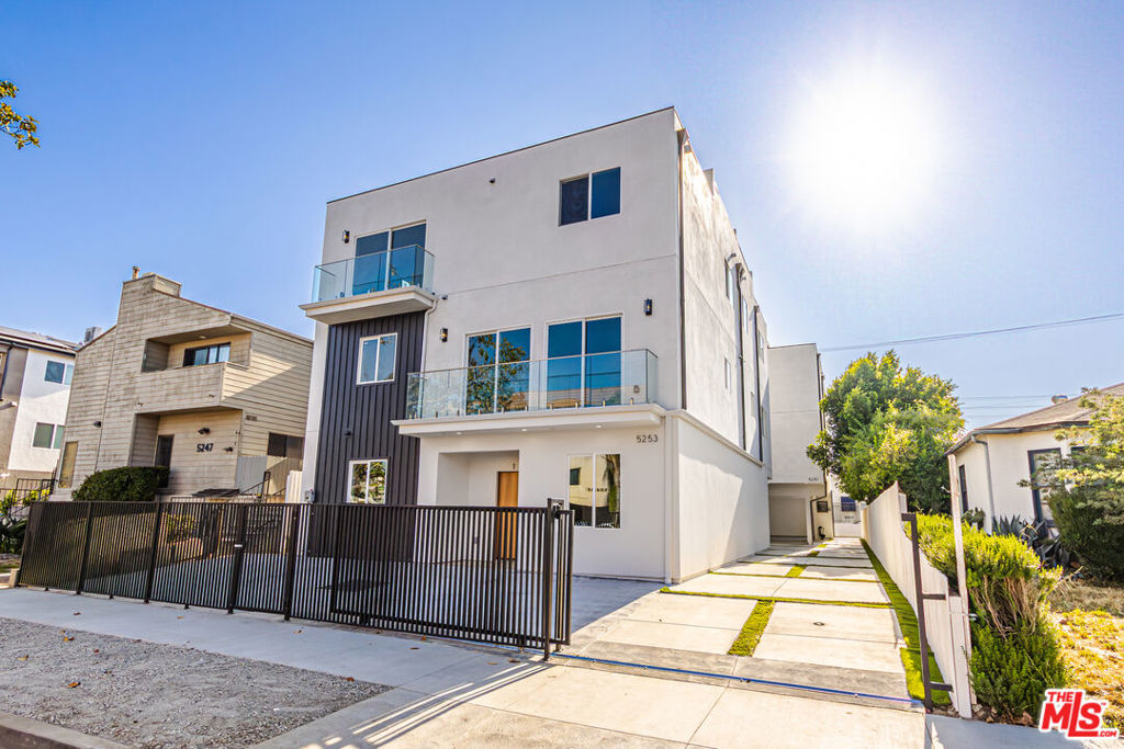 Welcome to 5251 Agnes, a gorgeous contemporary townhomes in the heart of Valley Village! Be the first person to live in this exquisite sleek and stylish modern new construction 3-story townhome with ROOFTOP Decks and unbeatable views! This stunning property effortlessly blends modern elegance with practical design, creating a perfect haven in one of LA's most desirable neighborhoods. **PET FRIENDLY** This rare and luxurious unit is located in prime Valley Village, a wonderful residential area that is walking distance to Sloanes Valley Village, the Thirsty Merchant, Gelsons, Royal Macaron, top tier schools, and so much more. This property is made up of Five pristine 2025 construction units that are filled with high ceilings, natural light and elegant finishes. The spacious and open floor plans include a large living room, dining area, and kitchen flow together effortlessly, perfect for entertaining or everyday living and a quiet street that offers street parking. The kitchen features a stylish center island with quartz countertops ideal for entertaining meal prep and socializing. Step onto the balcony to enjoy morning coffee or unwind in the evening breeze for some relaxation and entertainment. Some of the many amenities include, Expensive designer kitchens with a huge island, stainless steel appliances, sleek grey cabinets and carrera tile backsplashes, two car garages, multiple balconies, private rooftop decks to unwind with unbelievable panoramic views and perfect for dining or relaxing! The bright, cheerful bedrooms and bathrooms, surrounded by windows everywhere letting in ample natural light, in-unit washers and dryers included, an exterior that has been landscaped to perfection and beautiful throughout wide plank european oak hardwood flooring. Enjoy living in this peaceful, private and walkable brand new community! This exclusive community of townhome residences offers upscale living, privacy and tranquility, all while being ideally located and just minutes from the vibrant Studio City( which has the trendy Erewhon, Equinox) Sherman Oaks, Universal Studios, Burbank, Toluca Lake, NoHo Arts district with easy access to shops, dining, major freeways, this townhome perfectly blends luxury, style, and convenience. Base rent is $5,450 and advertised price takes into account the 1 month free deduction to reduce the rent to $4,999.