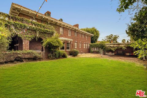 Photo of 1130 Westchester Place, Los Angeles, CA 90019 (MLS # 25569207)