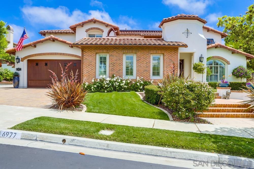 Welcome to 6977 Corte Langosta — a stunning 5-bedroom, 5.5-bath, two-story home tucked away on a quiet cul-de-sac in the desirable La Costa Ridge community of Carlsbad. Inside, enjoy soaring ceilings, beautiful custom ironwork inside and out, and spacious living and dining areas filled with natural light. The open kitchen features stainless steel appliances, a large island, and custom built-in cabinets for plenty of storage. The generous primary suite offers a walk-in closet and spa-like bath, while each bedroom includes its own en-suite for privacy and comfort. Step outside to your entertainer’s dream backyard with a sparkling pool, hot tub, built-in BBQ, and custom backyard pergola. Enjoy the convenience of owned solar, a whole-house water softener, a custom garage door, a paver driveway, and a 2-car garage with built-in cabinetry and a bonus game room. All of this just minutes from top-rated schools, golf, shopping, and Carlsbad’s beautiful beaches. Owned solar, water softener, paver driveway, custom garage door, custom built in cabinets, custom backyard pergola, custom iron work inside and out.