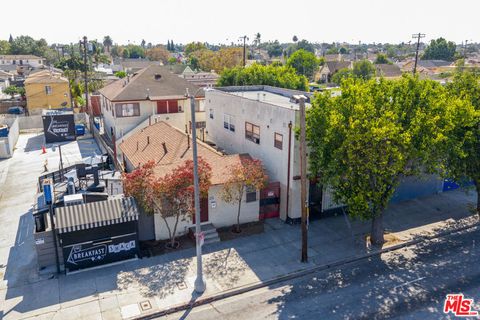 Photo of 1412 W Florence Avenue, Los Angeles, CA 90047 (MLS # 25599017)