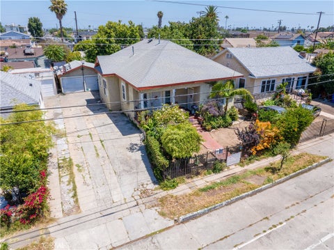 Photo of 821 823 W 98th Street, Los Angeles, CA 90044 (MLS # SR26125409)