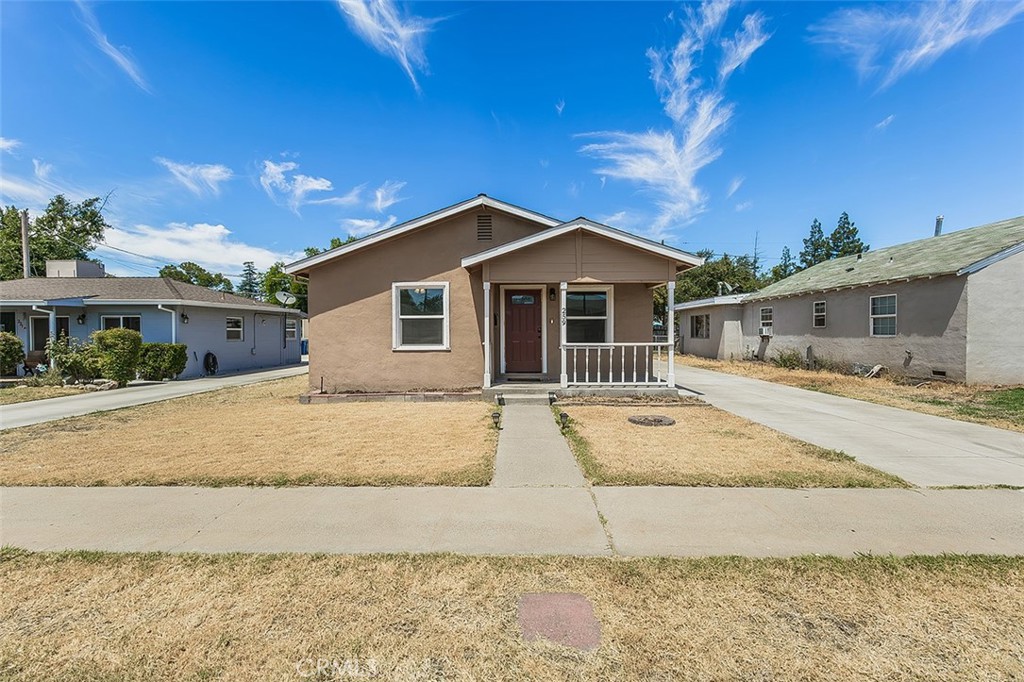 Fully renovated in 2021, this charming home features updated appliances, modern flooring, fresh interior paint, and more. Stay connected and secure with a SimpliSafe alarm system and Smart Thermostat, both of which can be controlled remotely from your phone. Exterior cameras will also remain with the property for added peace of mind. Enjoy abundant natural light throughout, complemented by energy-efficient dual pane windows.
The property offers a generous yard with fruit-bearing peach and orange trees, a detached garage, and a long driveway with ample parking. Additional engineered hardwood flooring is included for replacements Located just a block from a local school and with plenty of street parking, this home combines comfort, convenience, and practicality.