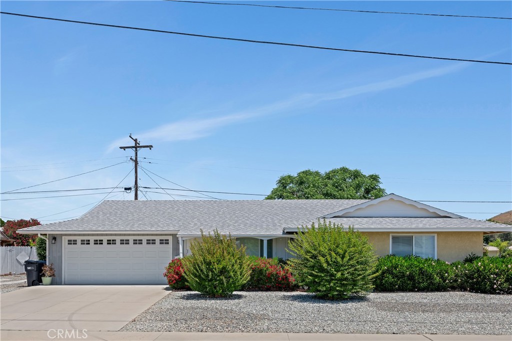 Welcome to this beautifully updated 2-bedroom, 2-bathroom 1,460 sq. ft. home located in the desirable 55+ active Sun City community of Menifee, where comfort meets style at an unbeatable value of $399,999.
Step inside to discover laminate flooring throughout the open floor plan, with natural light streaming through energy-efficient dual-pane windows. Ceiling fans in every room ensure year-round comfort, while the freshly painted interior and plantation shutters offer an inviting atmosphere with a living room opening into both the kitchen and hall. The kitchen and dining room have a lot of cupboard space and are adjacent to the sunroom looking out to the covered patio brick-fenced back yard with mature landscaping and privacy. The ensuite bathroom has a remodeled walk-in shower.
New updates include pantry and laundry cabinets, countertop, and a new dryer. Lined plumbing from house to street. Garbage disposal.
Newer updates include a refurbished primary bathroom, 2-car garage fully equipped with floor-to-ceiling Formica shelving, providing exceptional storage space.
SCCA provides numerous activities including an indoor tournament shuffleboard court, tournament horseshoe pits, an amphitheater, pickle ball a fitness center, two pools, spa, tournament lawn bowling and a variety of clubs and social activities, all of which enrich Sun City's active 55+ adult lifestyle. Sun City is dedicated to making your retirement the best that it can be and is located close to the local shopping, wine country and shopping.
Don’t miss this move-in-ready gem in Sun City—schedule your showing today!