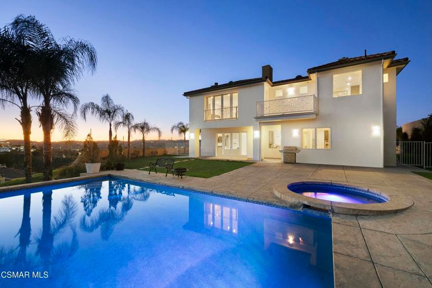 Welcome to this pristine, gated and very private estate with beautiful panoramic views for days! Nestled in Woodland Hills, south of Ventura Blvd, this is an entertainer's dream encompassing both indoor & outdoor living spaces with nearly 5,300 sqft, 4 bedrooms and 5 baths. You are welcomed into the living areas with lots of natural light, cathedral ceilings, and a cozy fireplace. The gourmet eat-in kitchen features a luxurious center island, large double refrigerator /freezer, walk-in pantry, plenty of cabinets for storage, and a wine refrigerator (add'l wine storage room in another area). All bedrooms are very spacious and offer plenty of natural light too. The house is equipped with a smart lighting system controlled by 3 wall-mounted iPads, with the family room, entertainment, and bedrooms all having surround sound in the ceiling. Yes, don't miss the incredible entertainment room with surround sound, four fireplaces, and an elevator! Enjoy free time in the private backyard with magnificent 180-degree views framing a sparkling infinity pool. This luxury home feels like a resort! Relax in the custom gazebo, equipped with a built-in cook center, fountain, and citrus trees. Plenty of parking in the gated driveway. plus the total garage space is 1,072 sf which includes a 3-car garage of 683 sf, a wine storage area of 230 sf, an elevator, and a central vacuum system. Don't miss the opportunity to make this Mediterranean Villa yours!!