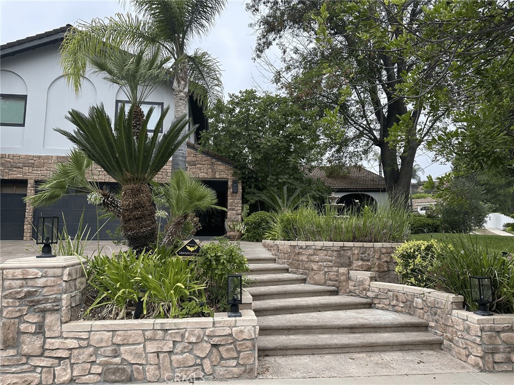 Breathtaking renovated estate offering the finest luxury experience and located within the highly desired Mulwood neighborhood of Calabasas. Bright open floor exuding tons of natural light and modern designer finishes throughout perfect to enjoy the California lifestyle. Sleek brand new chef's kitchen with custom cabinetry, quartz countertops and SubZero/Wolf appliances. This stunning home features over 4,400 sqft of living space and 6 six spacious bedrooms. Large glass pocket doors open to the backyard which is a true entertainers paradise featuring a new poo/spa, BBQ center, fire pit area, large covered patio, outdoor bath/shower, sport court and tons of grassy space. Oversized master suite with balcony overlooking to the yard, walk-in closet and indulging master bathroom with sauna. Additional amenities include home gym, security cameras and surround sound system. Located just minutes away from upscale boutique/shops, The Commons, and award winning LVUSD schools.