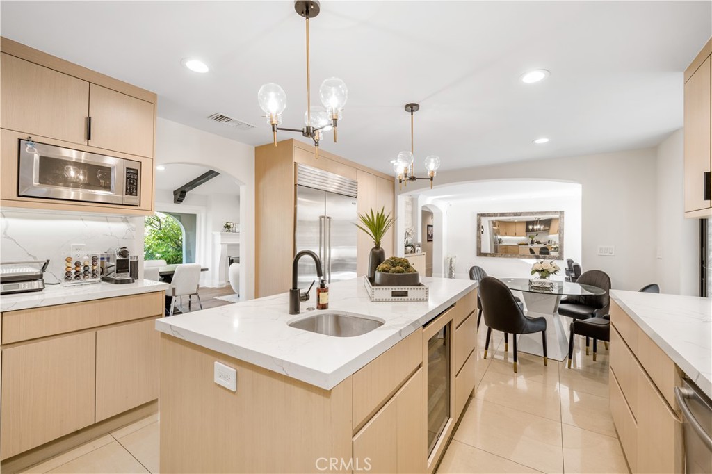 Breathtaking renovated estate offering the finest luxury experience and located within the highly desired Mulwood neighborhood of Calabasas. Bright open floor exuding tons of natural light and modern designer finishes throughout perfect to enjoy the California lifestyle. Sleek brand new chef's kitchen with custom cabinetry, quartz countertops and SubZero/Wolf appliances. This stunning home features over 4,400 sqft of living space and 6 six spacious bedrooms. Large glass pocket doors open to the backyard which is a true entertainers paradise featuring a new poo/spa, BBQ center, fire pit area, large covered patio, outdoor bath/shower, sport court and tons of grassy space. Oversized master suite with balcony overlooking to the yard, walk-in closet and indulging master bathroom with sauna. Additional amenities include home gym, security cameras and surround sound system. Located just minutes away from upscale boutique/shops, The Commons, and award winning LVUSD schools.