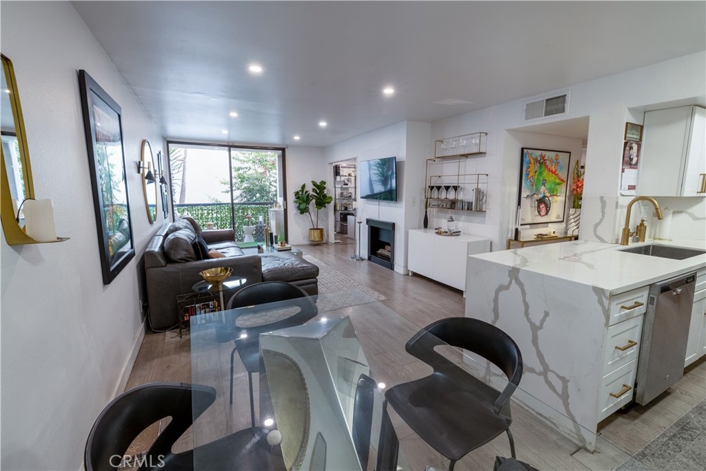 Live Auction! Bidding to start from $640,000! Traditional Non-distressed, property. Cash or Finance ok! Seller will entertain offers prior to the Auction date.
Welcome to 906 N Doheny Dr #303, a beautifully updated 2 bed, 2 bath condo offering approx. 1,000 sq ft of stylish living in the heart of West Hollywood. Inside, you’ll find an open-concept living area with a remodeled kitchen featuring marble countertops and recently upgraded appliances. Each bathroom has also been remodeled with stone/quartz finishes for a modern, elegant touch. The second bedroom includes a side-by-side washer and dryer and, without a closet, makes an ideal guest room, den, or home office. Both bedrooms enjoy the privacy of en-suite bathrooms, and the balcony provides rare seclusion with no direct views into neighboring units. Community amenities include a pool with spacious outdoor lounge, fitness center, sauna, laundry rooms, two trash chutes per floor, secured mail room, and gated garage parking. The building underwent a complete remodel just 4½ years ago with new carpet, paint, wallpaper, and fixtures, and has since been upgraded with a state-of-the-art security system with cameras and the ButterflyMX video intercom and access control system with convenient fob entry. Ideally located near the Sunset Strip, Santa Monica Blvd, and Beverly Hills, this home combines updated interiors, premium building amenities, and a prime location for the best of West Hollywood living.
