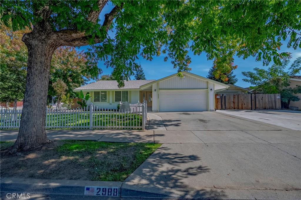 Beautifully Renovated Corner-Lot Gem in Merced with multiple garages!!!  Welcome home to this stunningly updated home on a desirable large corner lot, where modern comfort meets classic charm. Step through the double-door entry and you’ll be greeted by a beautiful living room fireplace, the perfect centerpiece for cozy evenings. The well-equipped kitchen sits just adjacent—completely renovated with granite countertops, sleek cabinetry, farmhouse sink, updated appliances and a pantry.  Throughout the home, you’ll notice thoughtful upgrades including crown molding, a whole-house fan, and tons of built in storage options.  The brand-new carpet (installed October '25) is a great compliment to the stylish mix of bamboo and slate flooring. The bedrooms are all generously sized and both bathrooms have been tastefully remodeled, offering a fresh, modern look.  Outside, enjoy the convenience of an attached two-car garage, a heavy duty double gate opening to the drive-through additional garage which leads to the workshop out back—ideal for projects, storage, or MORE parking. The property is an entertainer’s (or Car-lovers) dream, featuring a large covered patio, extra storage shed, and ample space for a future pool.  Don't miss your chance to call it home!