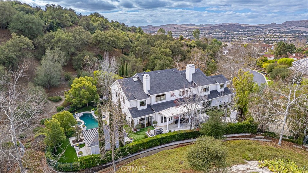 Welcome to 19 Devonwood Drive, One of Coto de Caza’s finest remodeled estates by Orange County’s Premier Maison Rose Interiors. From the moment you walk in the dramatic entry you realize no expense was spared in completing this remarkable 5 Bedrooms, 7 Bathrooms, plus Bonus room, plus Billiard room and Office Space. Every attention to detail imaginable was thought of in creating this exceptional Estate including Top of the line Kolby Windows, Pinky’s Doors throughout, New HVAC units, Paid for Solar, New Roof, Designer Wood Floors, Custom Cabinets, New Stunning Kitchen & Bathrooms, Climate Controlled Wine Cellar, New Water Heater & Upgraded lighting inside and out. The elegant resort like back yard is an entertainers dream and offers the ultimate privacy backing to acres of open space for a serene park like setting. Salt water pool and spa, large California Room with TV, Outdoor Kitchen BBQ entertainment area, outdoor dining and a fireplace seating area. Come experience what unparalleled modern luxury feels like in the one of a kind Coto Estate.