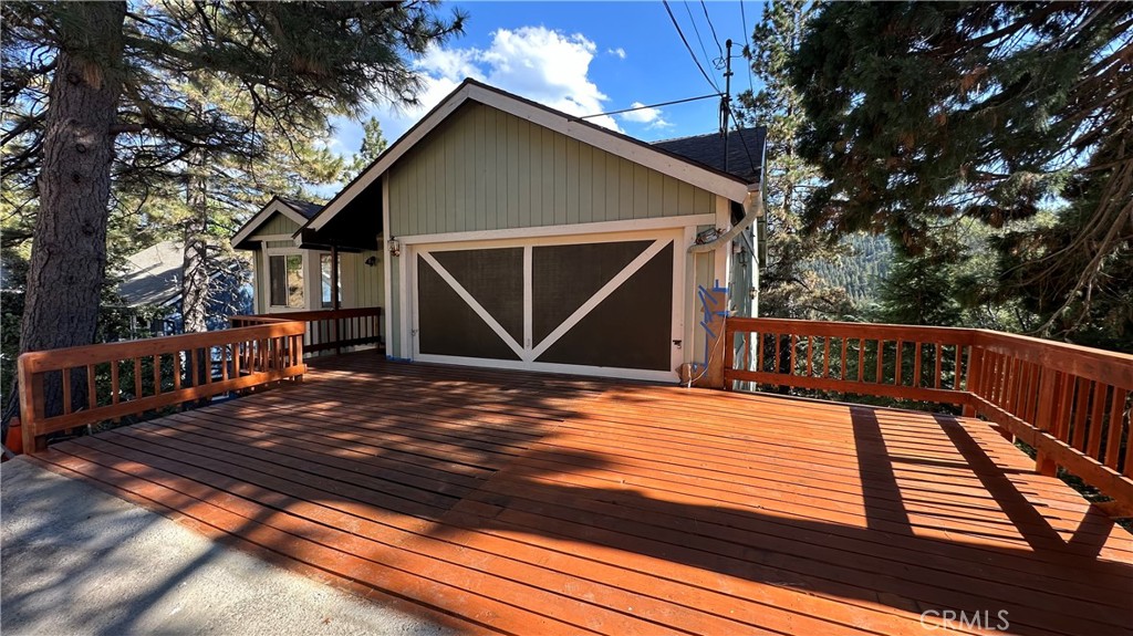 AWESOME!!! over 2900 SQFT LIVING SPACE!! This property presents an excellent investment opportunity, ideal as a secondary residence, weekend retreat, or Airbnb rental, especially for the upcoming holiday season. Conveniently located near Lake Gregory Community in a thriving area, this property offers easy weekend escapes without extensive travel. Immerse yourself in the picturesque ambiance of the tranquil pine forests of Crestline, CA. This charming cabin provides a scenic retreat in the heart of nature, near Crestline's shops, restaurants, and recreational opportunities, including Gregory Lake, just a 15-minute walk away. COMPLETELY REMODELED!! This property features a sprawling porch, perfect for enjoying the mountain air. The interior boasts exposed wooden accents, creating a warm atmosphere. The living room features a fireplace and large windows with stunning woodsy views. The chef's kitchen offers ample counter space and rich wooden cabinetry, a dining area provides a space to gather, enjoying the outdoors through expansive windows. Downstairs, the bedrooms offer comfort with carpets and views of the forest. Bathrooms feature gold fixtures. The home includes three spacious bedrooms, an office room suitable as a fourth bedroom with wood cabinets, and three and a half bathrooms, offering ample space and storage. The lowest level features a custom wooden bar, seating eight, ALL NEW APPLIANCES included. The property comfortably accommodates thirteen guests and includes a two-car garage. Recent upgrades include new laminate flooring, new carpeting in the bedrooms, a new roof, fresh interior and exterior paint, refurbished wood accents, frames, and kitchen/bath cabinets and new front deck.
Don't miss this wonderful cabin!
OFFER DEADLINE SEP 12 AT 5PM!!