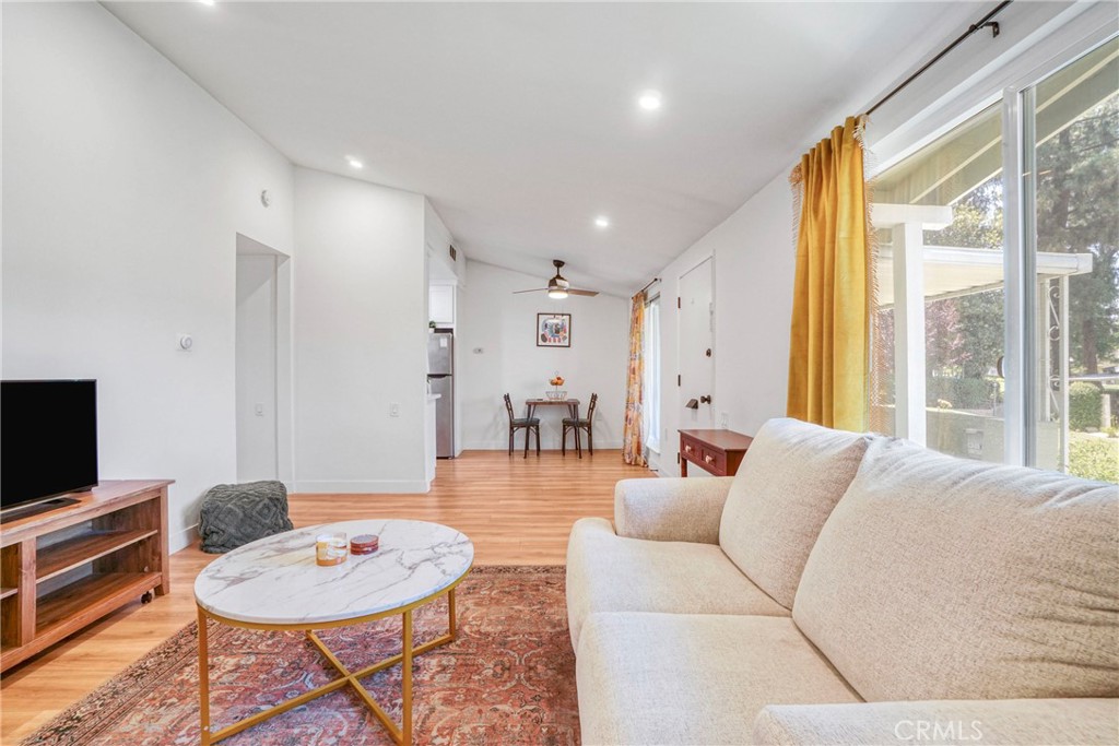 Don’t miss this rare opportunity to own a beautifully upgraded, move-in ready, single-story end unit in the highly desirable 55+ Friendly Valley community—offering privacy, comfort, and resort-style living in the heart of Santa Clarita. This light-filled 2-bedroom, 1-bath, 806 sqft home has no neighbors above or below. It features a fully remodeled kitchen with quartz countertops, soft-close cabinets, stainless steel appliances, and an in-unit stackable washer and dryer. Additional upgrades include luxury vinyl plank flooring, tile bathroom flooring, dual-pane vinyl windows, recessed LED lighting, upgraded HVAC, and a remodeled bathroom with a dual vanity and modern shower. Friendly Valley is a guard-gated, master-planned community offering an 18-hole pitch & putt golf course, swimming pool and spa, auditorium, clubhouse, library, exercise room, game room, woodworking shop, ceramics studio, poker room, shuffleboard courts, horseshoe court, basketball court, lawn bowling, picnic areas, and BBQs. HOA dues include water, trash, hot water, sewer, roof and building maintenance, landscaping, basic cable TV, insurance, and 24/7 gated security. Conveniently located near Costco, CVS, Starbucks, Stater Bros, dining, and medical services. This is one of the few available homes in a tightly held community—schedule your private tour today and discover the lifestyle that awaits!