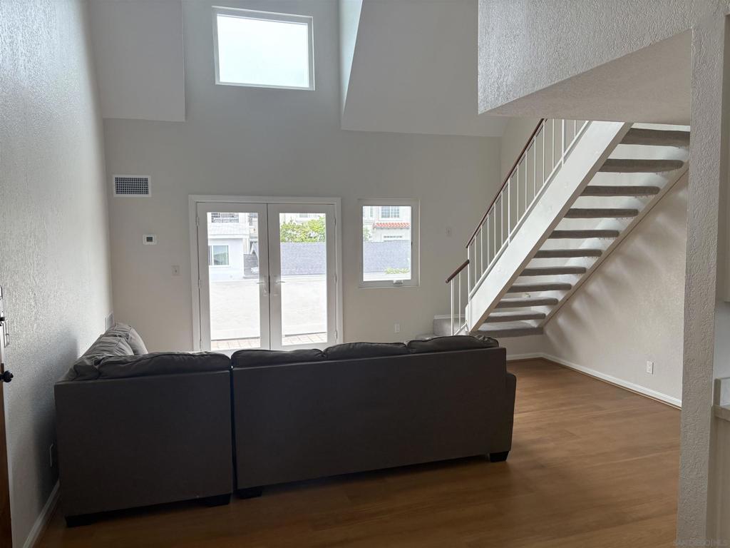 Beautiful light and bright home with soaring ceilings*Vinyl plank flooring*upgraded kitchen*Nice patio area off of living room*Parking garage with 2 assigned parking spaces and storage locker*Walking distance to all the wonderful amenities Coronado has to offer!