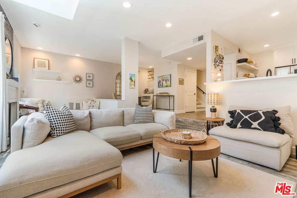 This 2-bedroom, 2.5-bathroom two-story townhouse in the heart of Brentwood is not to be missed. The main level features an open-concept layout with a remodeled kitchen, living and dining areas, a cozy reading nook with built-in bench, fireplace, and a powder bath. Upstairs, you'll find the spacious primary suite with private balcony, large walk-in closet, and en suite bath. A second bedroom and full bathroom and an in-unit laundry area complete the second floor. Building amenities include two tandem parking spaces in a secured garage, a fitness room, eight guest parking spots, 24-hour building surveillance, and beautifully upgraded lobby and hallways. All ideally located near Brentwood's top dining, shopping, schools, and parks. Physical address is 514 Barrington Ave. Available now, lease to be 13 months +.