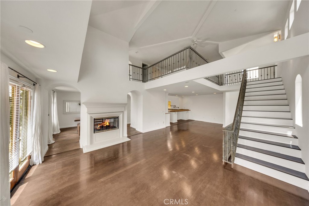 Welcome to your dream coastal retreat at 611 9th Street in Hermosa Beach. A stunning 2,584 square feet | 3 bedrooms | 4 baths | + a large loft | townhome that embodies luxury and the vibrant South Bay lifestyle! This light-filled masterpiece offers its own private outdoor space on every floor perfect for soaking up the salty ocean breeze, enjoying it’s unobstructed views of the gorgeous sunsets and is part of the prestigious Hermosa Beach school district.
The expansive primary suite is a serene escape with a walk-in closet, a spa-like en-suite bathroom with a separate spa-tub, dual sinks, glass enclosed shower with natural stone and private patio with stunning views and a perfect place to unwind with a glass of wine at the end of your day. This level also includes two additional spacious bedrooms and a full bathroom.
On the second level step into an open-concept sun filled living space with soaring vaulted ceilings, a cozy see through fireplace to a more private dining room. Notice the large west-facing windows that bathe the home in natural light with direct access to large deck with stunning views.
The gourmet kitchen is a chef’s paradise, featuring vaulted ceiling, stone countertops, upgraded stainless steel appliances, with lots of cabinetry perfect for entertaining. In the dining area you will find a separate dinning room with a stunning fireplace. With hardwood floors, recessed lighting, and unique stone accents, every detail exudes warmth and elegance.
The top level loft showcases a private full bathroom, mini kitchenette with a sink and a wine fridge. The loft area is perfect for an office, media room, or even an 4th bedroom with access to a breathtaking private deck with views from Palos Verdes to Malibu.
The 2-car garage, with direct access into the home, hosts a sizable laundry room and entry area with ample storage space.
Are you ready to embrace beach living? Then this is the home for you! This home is conveniently located just steps from the greenbelt, farmer’s market, and Hermosa’s iconic pier, restaurants, and shops, this move-in-ready townhome offers the ultimate blend of luxury and coastal charm. Don’t miss your chance to live the quintessential California beach lifestyle and schedule a tour today!